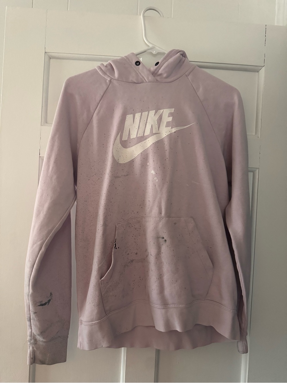 2 Nike Hoodies with paint splatter